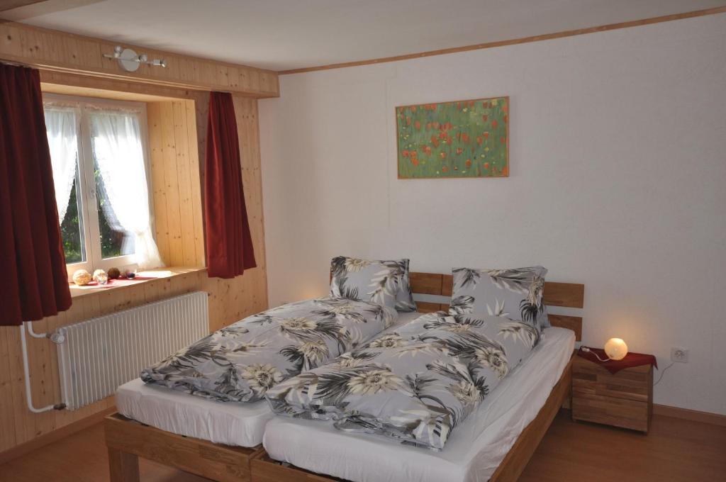Postel nebo postele na pokoji v ubytování Gasthaus Waldheim