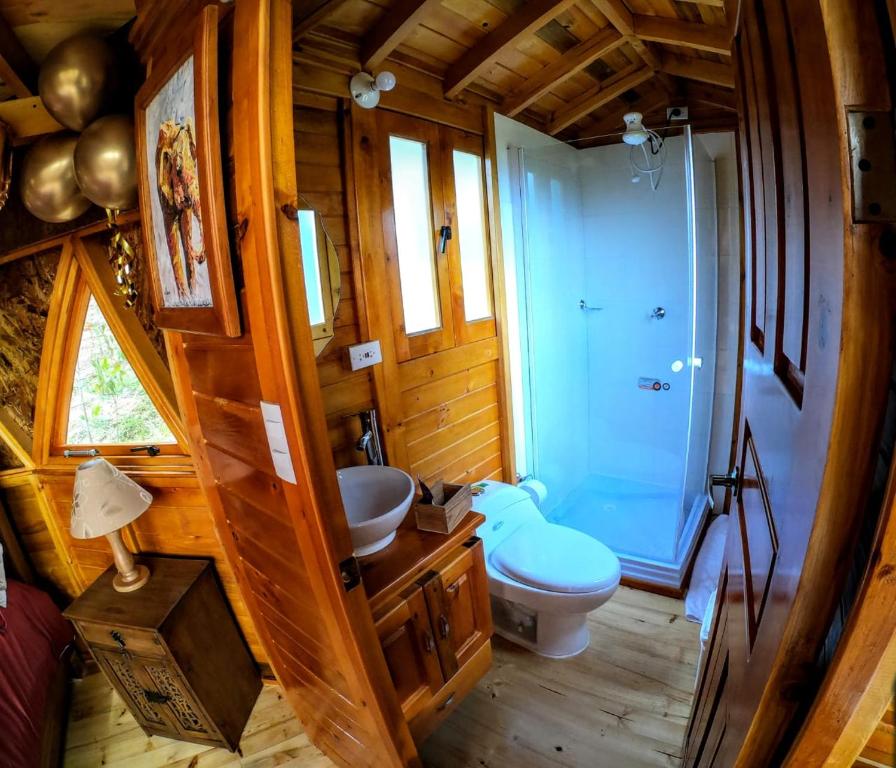 Katil atau katil-katil dalam bilik di Libélula Glamping con jacuzzi