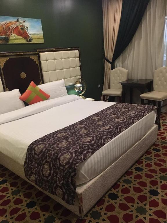 Postel nebo postele na pokoji v ubytování Omar Elkhaiam Hotel