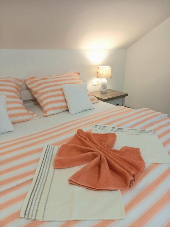Postel nebo postele na pokoji v ubytování Apartmán pod Sivým vrchom