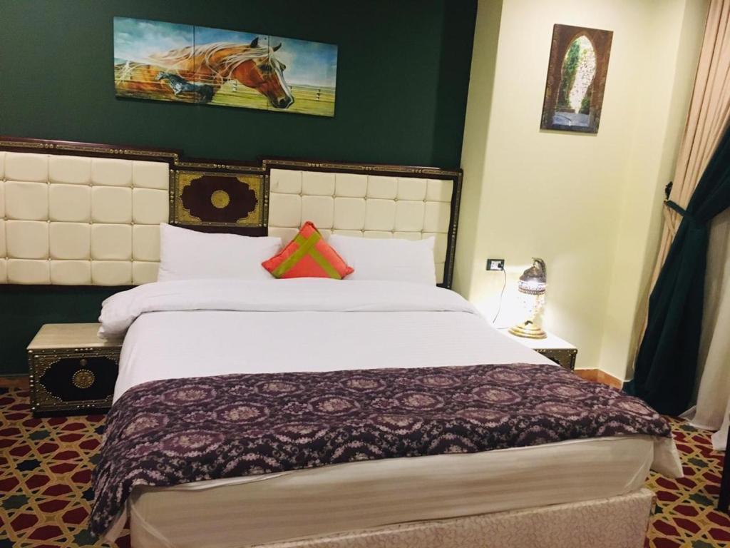 Postel nebo postele na pokoji v ubytování Omar Elkhaiam Hotel