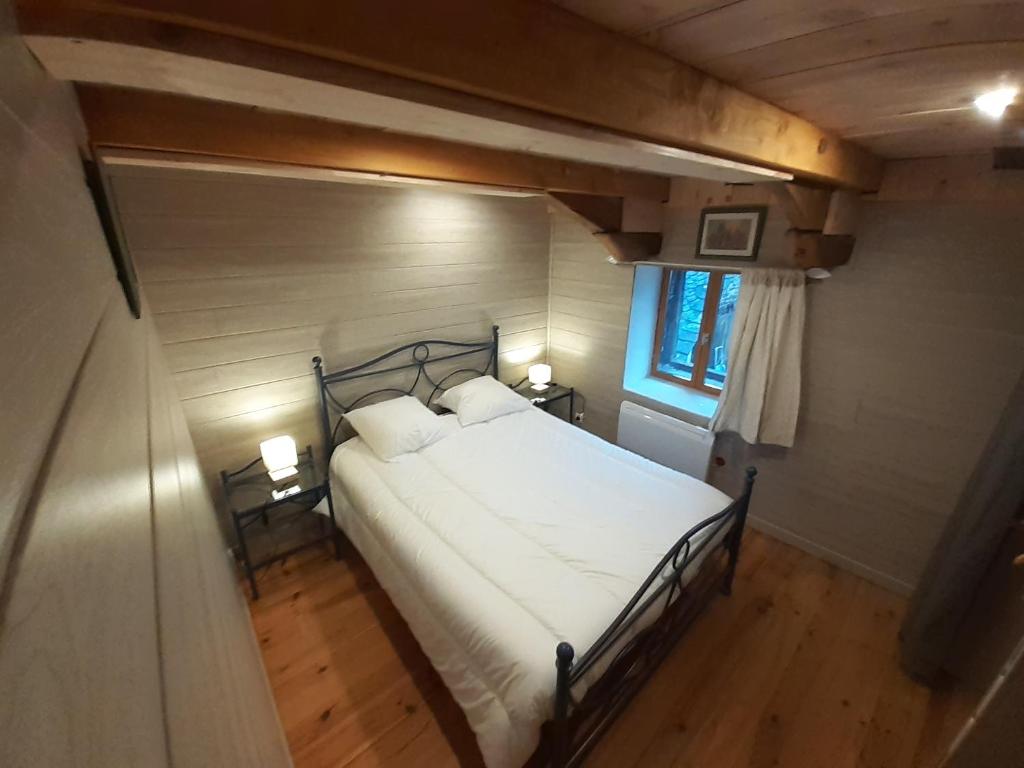 Postel nebo postele na pokoji v ubytování Le val de coussane