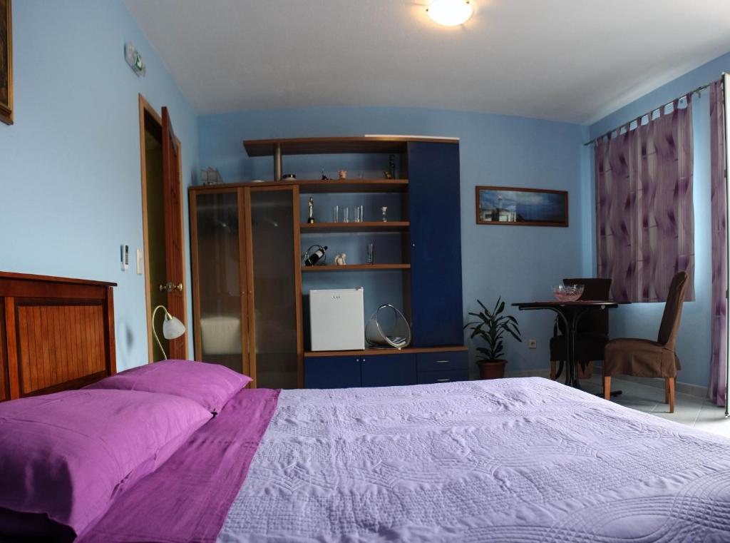Posteľ alebo postele v izbe v ubytovaní Villa Tudor