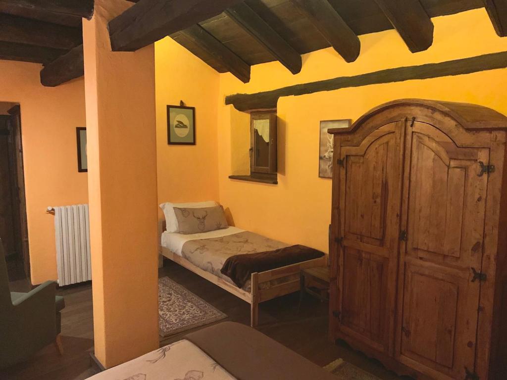 Łóżko lub łóżka w pokoju w obiekcie Locanda Allevè Hotel Ristorante