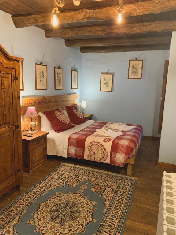 Łóżko lub łóżka w pokoju w obiekcie Locanda Allevè Hotel Ristorante