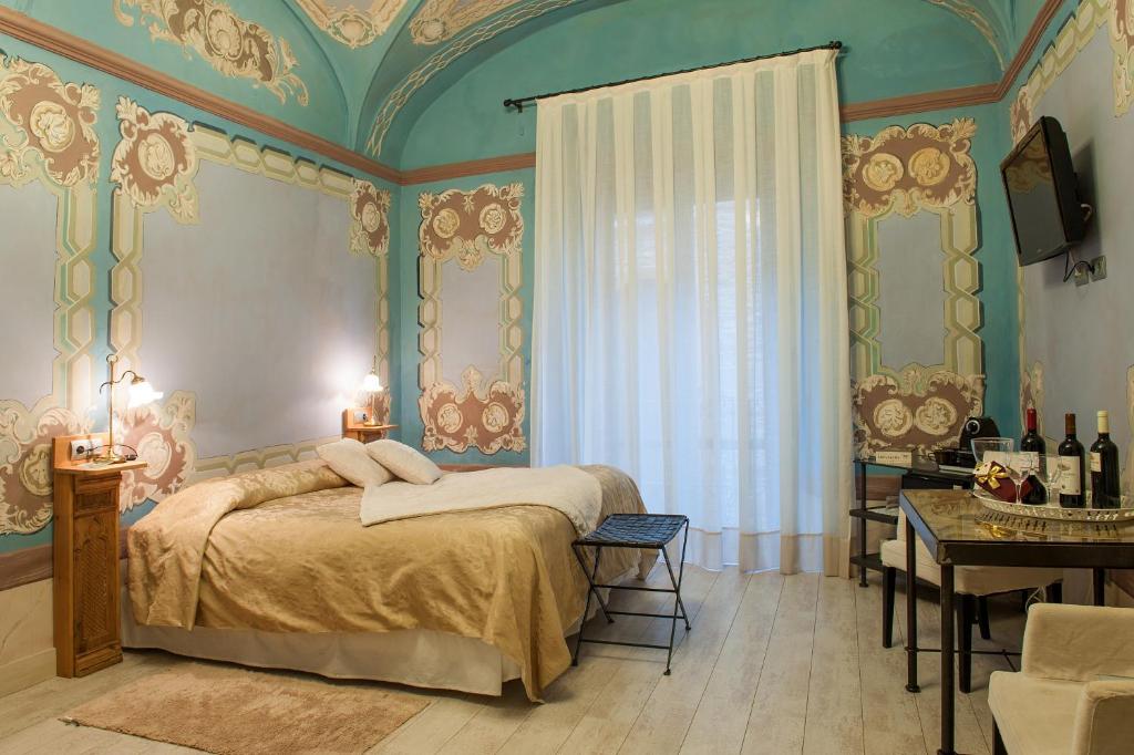 Posteľ alebo postele v izbe v ubytovaní Hotel-Spa Classic Begur