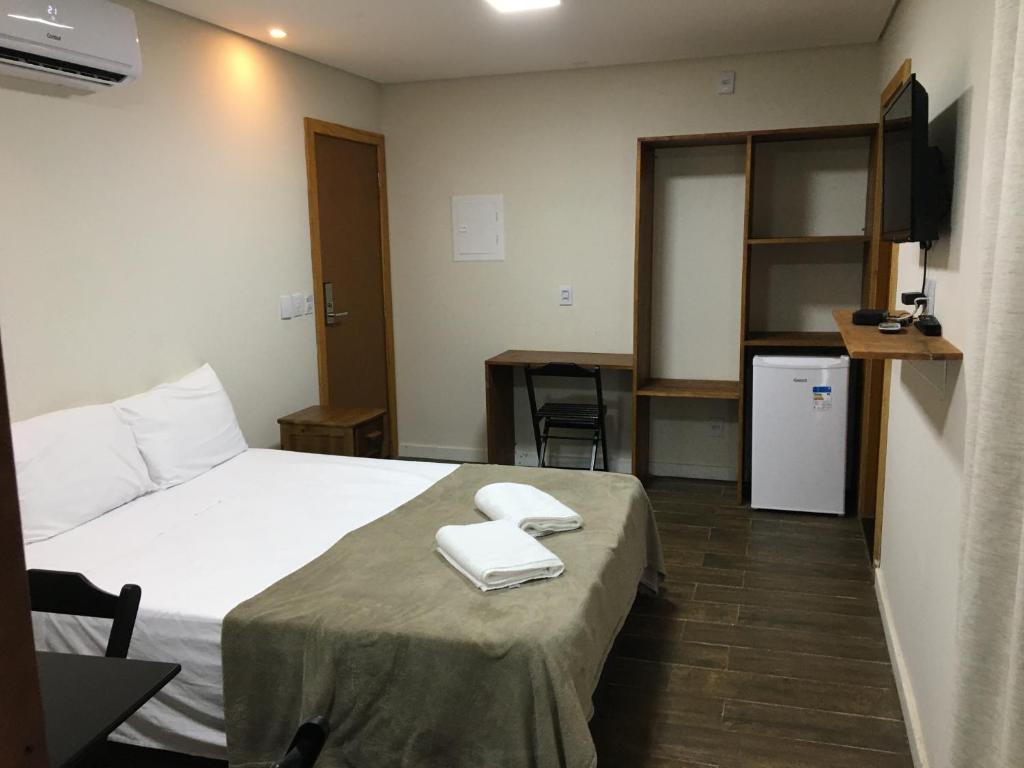 Postel nebo postele na pokoji v ubytování Trakai Suites