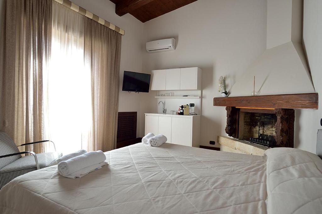 Postel nebo postele na pokoji v ubytování Casa Realia