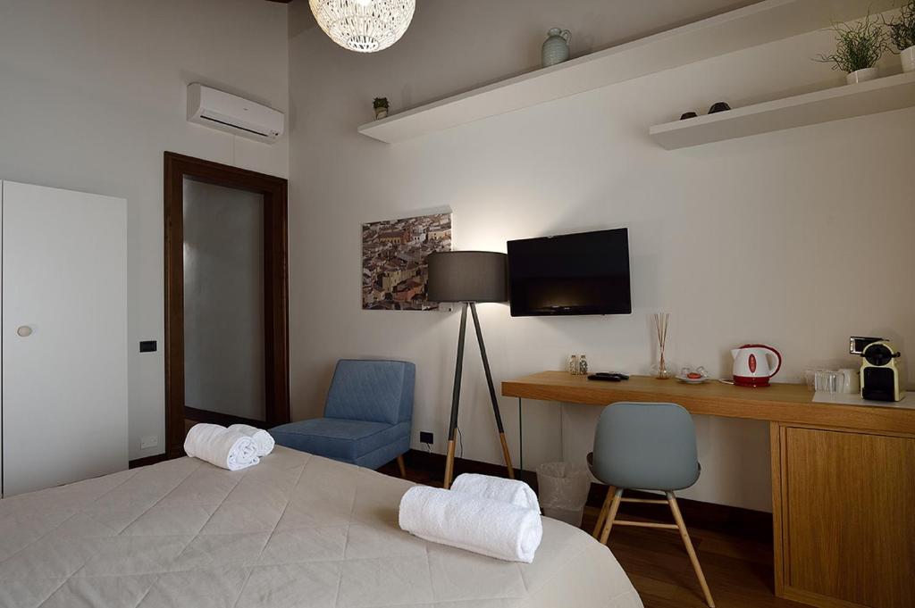 Postel nebo postele na pokoji v ubytování Casa Realia