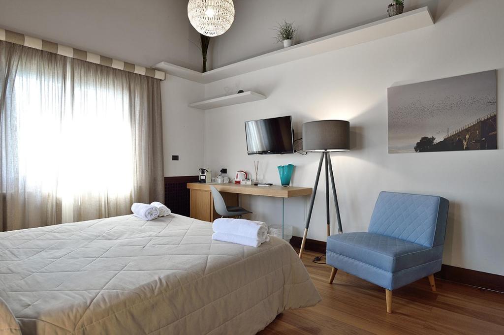 Postel nebo postele na pokoji v ubytování Casa Realia