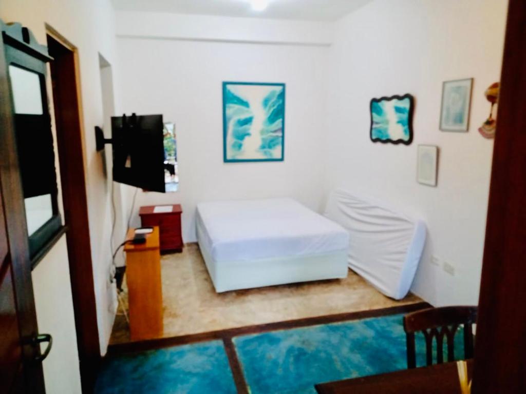  Suíte com Ar + frigobar+ Tv Sky