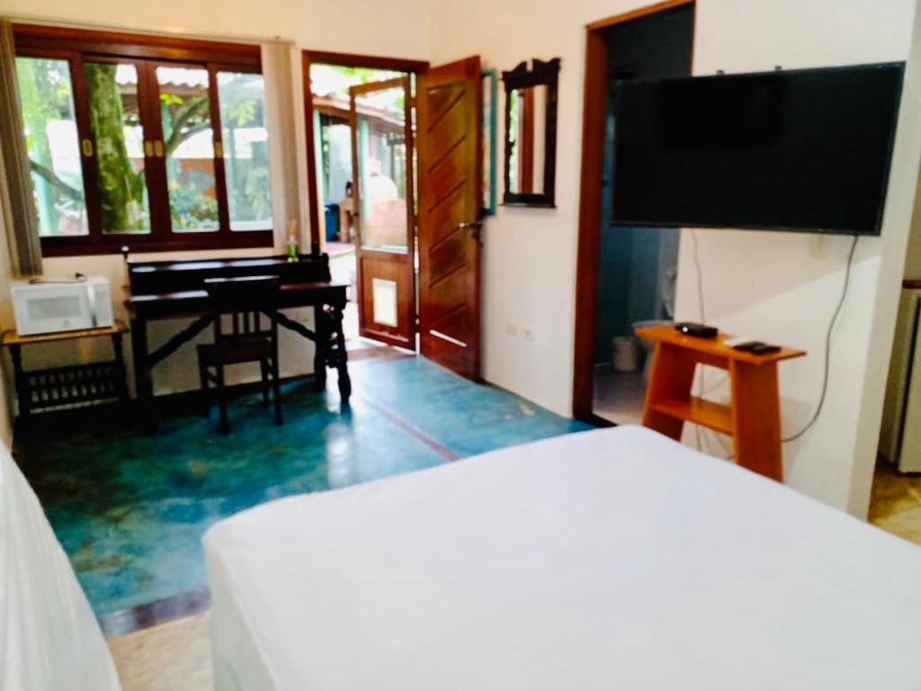  Suíte com Ar + frigobar+ Tv Sky