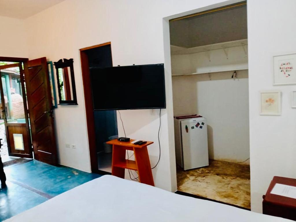  Suíte com Ar + frigobar+ Tv Sky