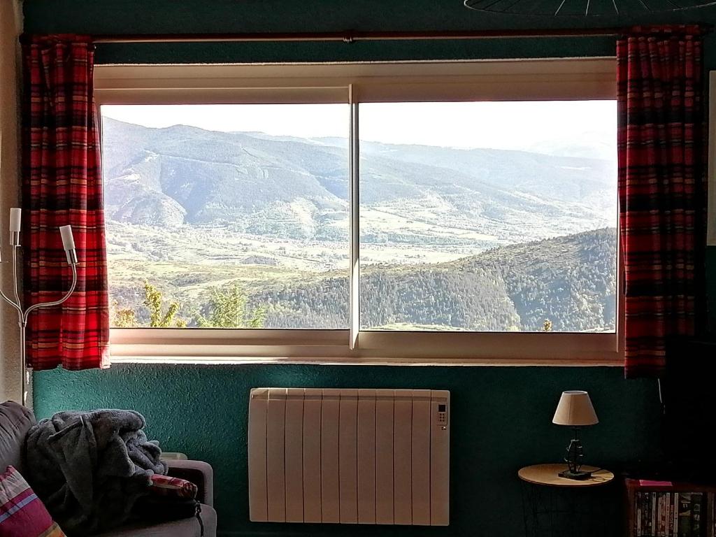Nespecifikovaný výhled na hory nebo výhled na hory při pohledu z apartmánu