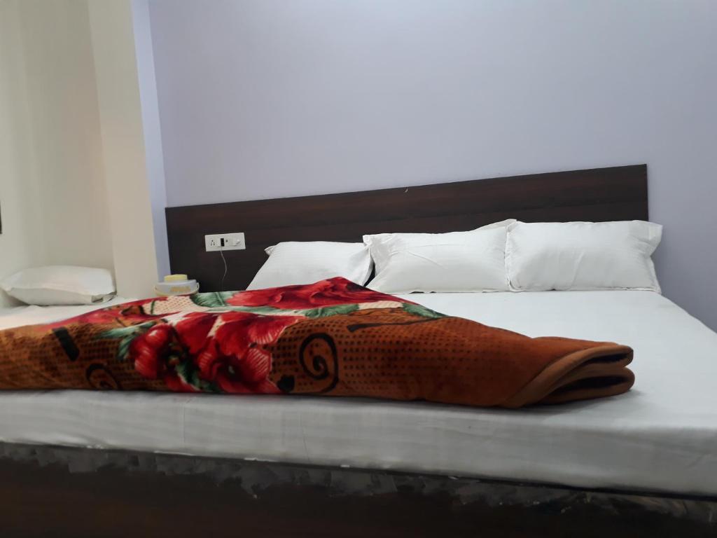 Postel nebo postele na pokoji v ubytování Hotel Chouhan Paradise