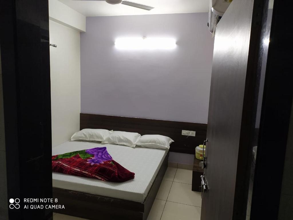 Postel nebo postele na pokoji v ubytování Hotel Chouhan Paradise