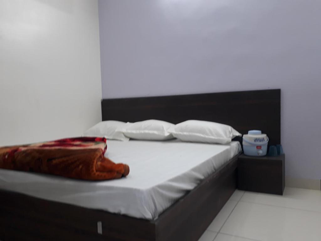 Postel nebo postele na pokoji v ubytování Hotel Chouhan Paradise