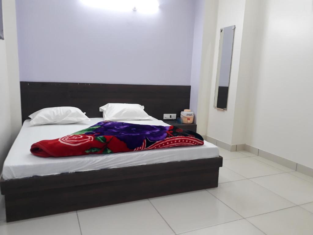 Postel nebo postele na pokoji v ubytování Hotel Chouhan Paradise