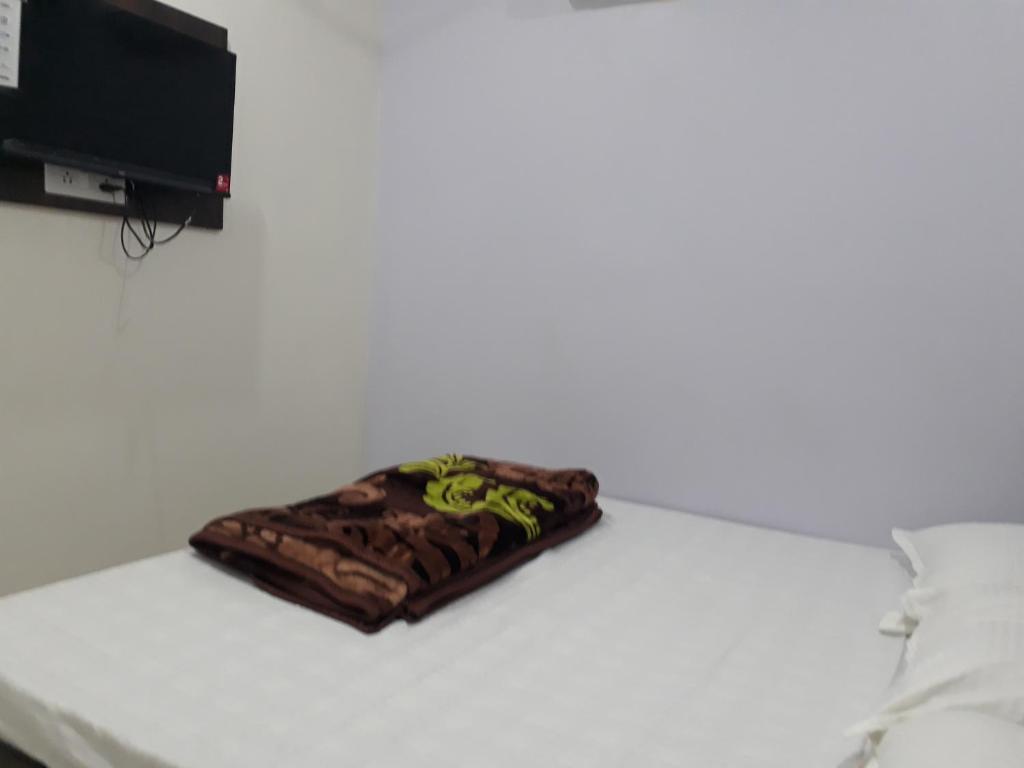 Postel nebo postele na pokoji v ubytování Hotel Chouhan Paradise