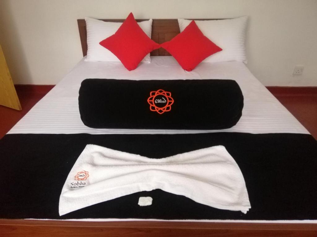 Postel nebo postele na pokoji v ubytování Sobha Holiday Home