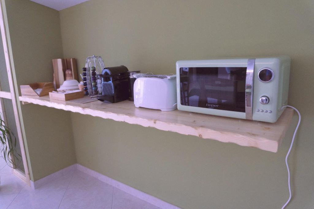 Kuchyň nebo kuchyňský kout v ubytování B&B Tra Gli Ulivi