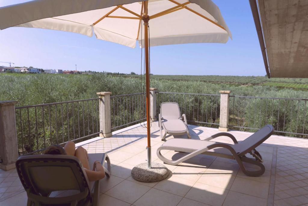 Balkón nebo terasa v ubytování B&B Tra Gli Ulivi