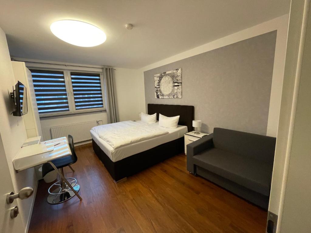 Postel nebo postele na pokoji v ubytování Hotel Teatro