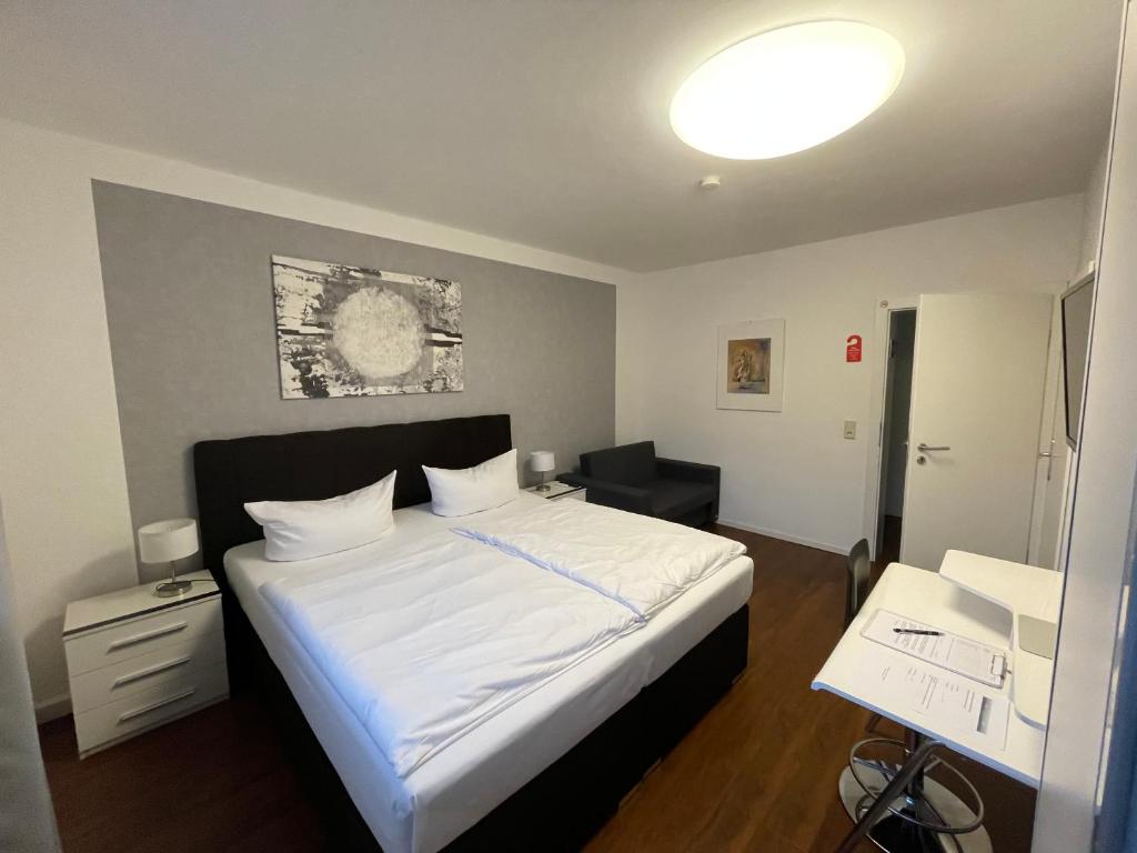 Postel nebo postele na pokoji v ubytování Hotel Teatro