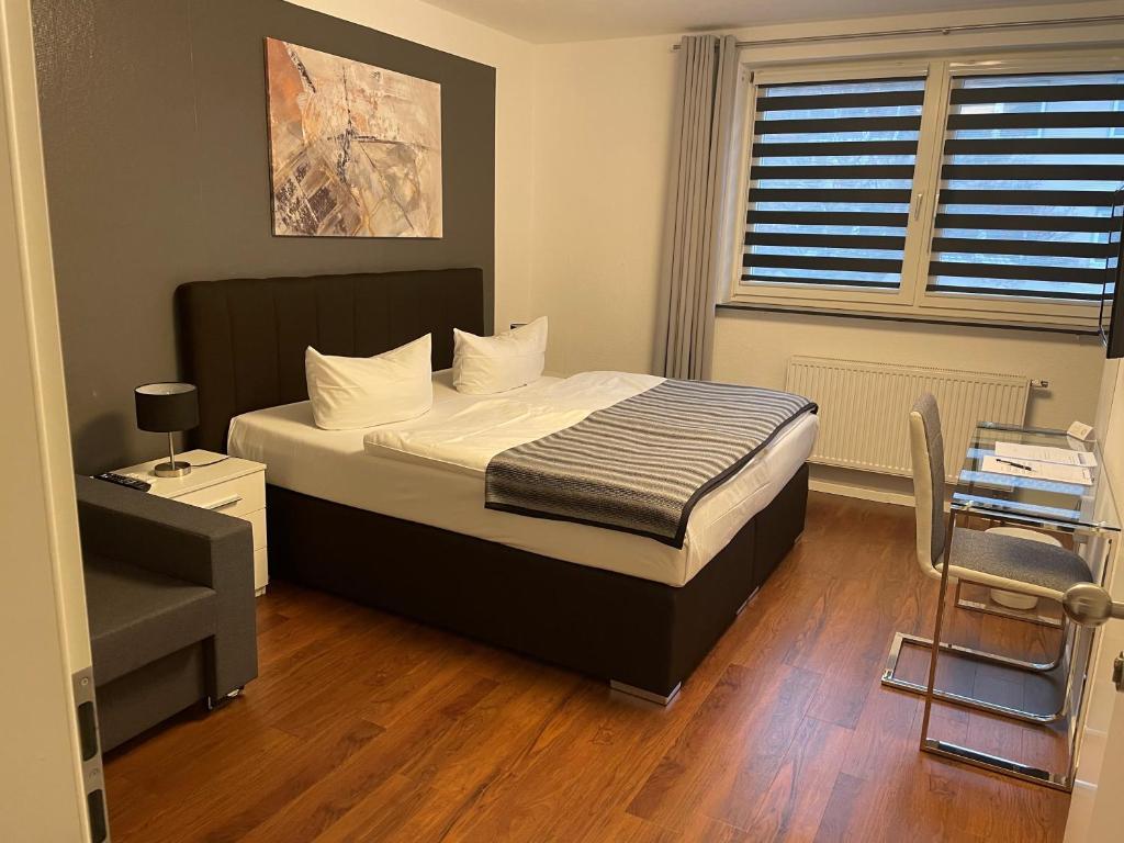 Postel nebo postele na pokoji v ubytování Hotel Teatro