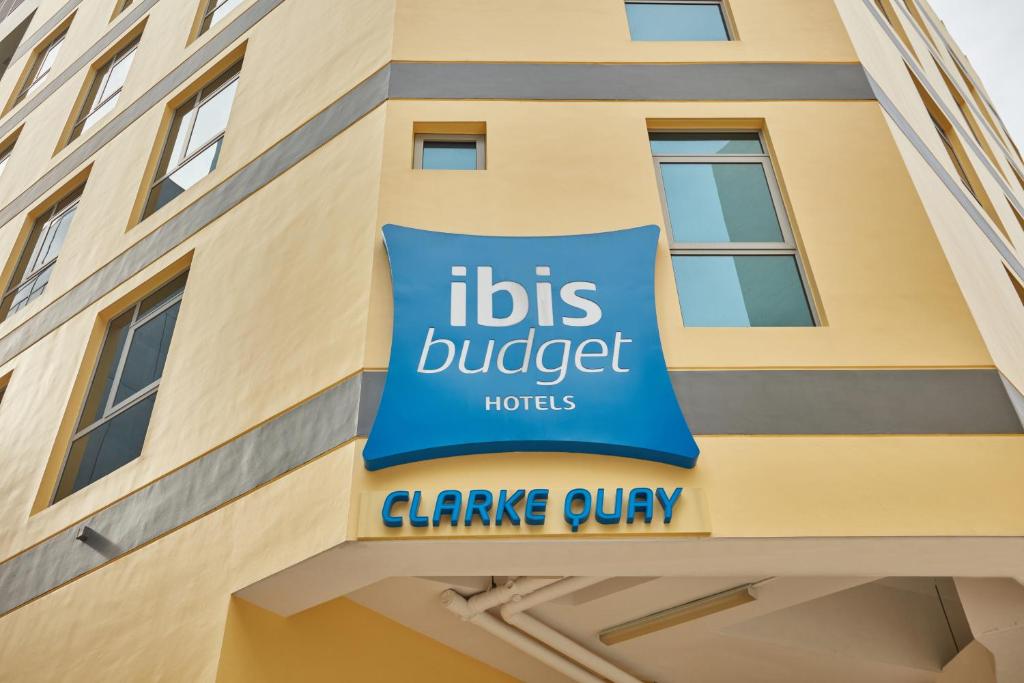 a sign on the side of a building at ibis budget Singapore Clarke Quay in Singapore