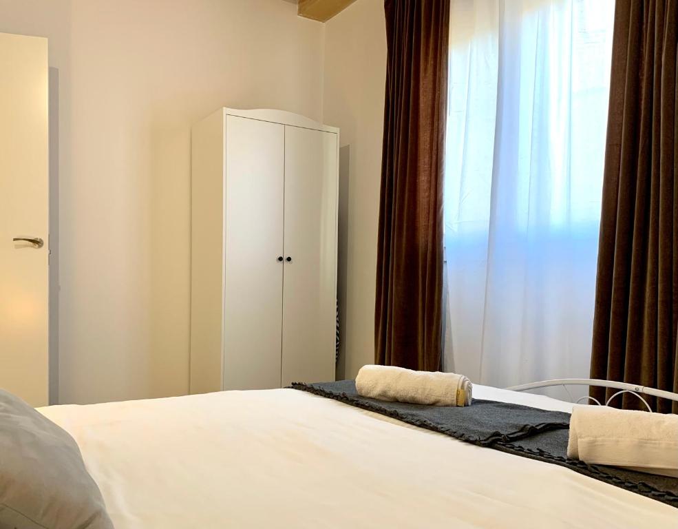 Postel nebo postele na pokoji v ubytování Vila Badalona
