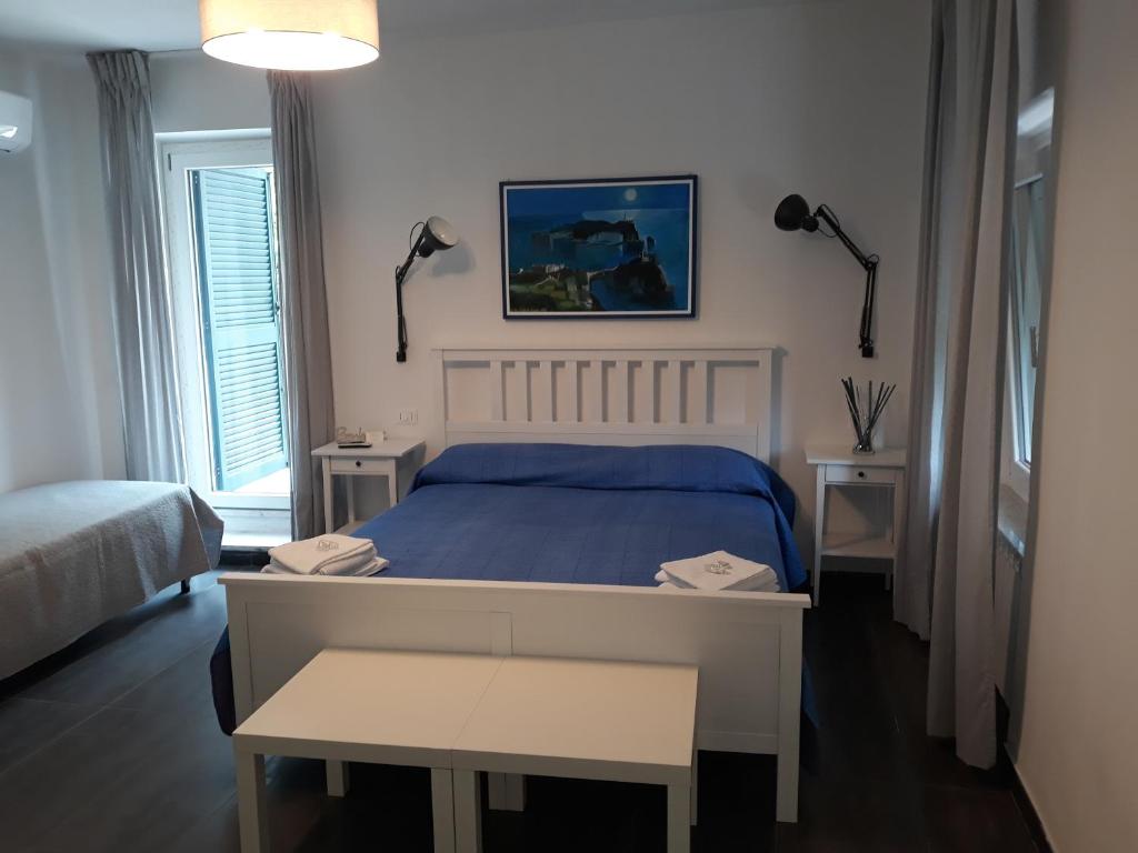 Postel nebo postele na pokoji v ubytování Casa Chiocconi