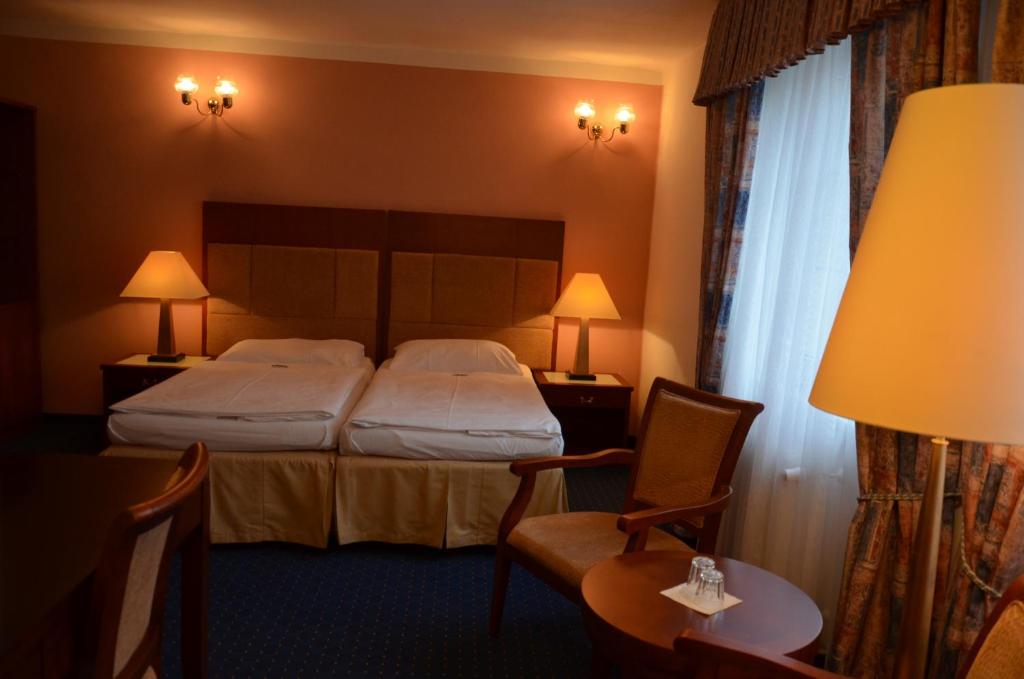 Postel nebo postele na pokoji v ubytování Eurohotel