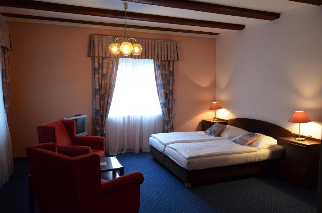 Postel nebo postele na pokoji v ubytování Eurohotel