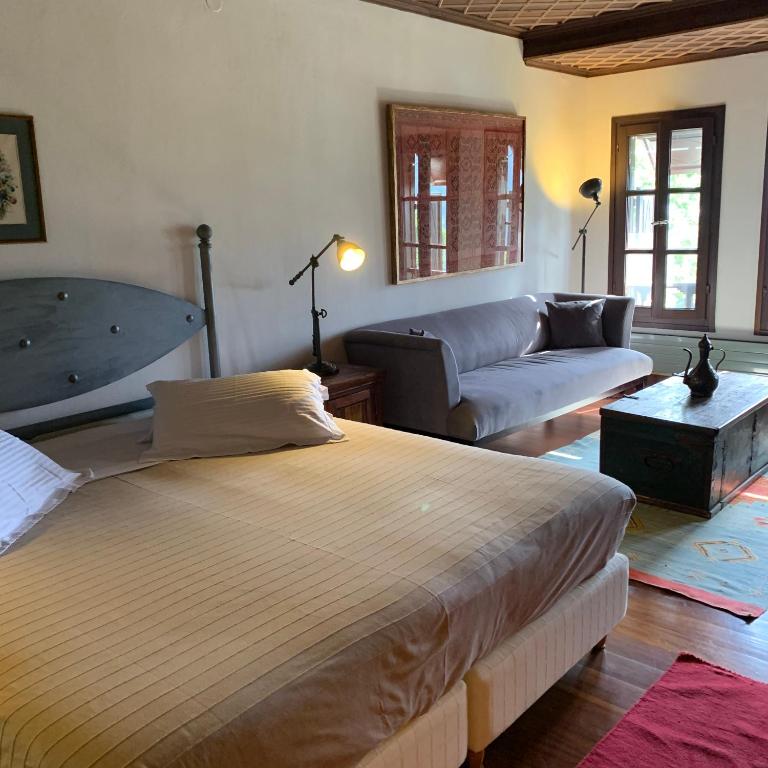 Postel nebo postele na pokoji v ubytování Palio Eleotrivio Guesthouse