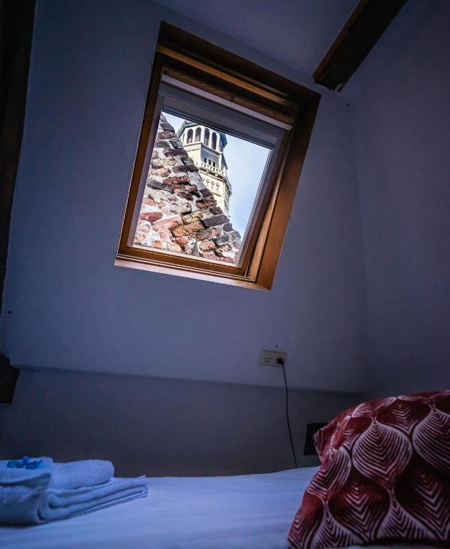 Postel nebo postele na pokoji v ubytování De Kaepstander