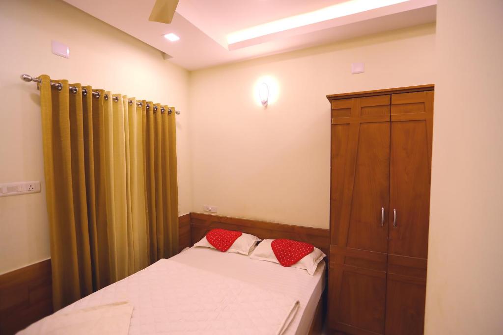 Postel nebo postele na pokoji v ubytování SAPPHIRE INN