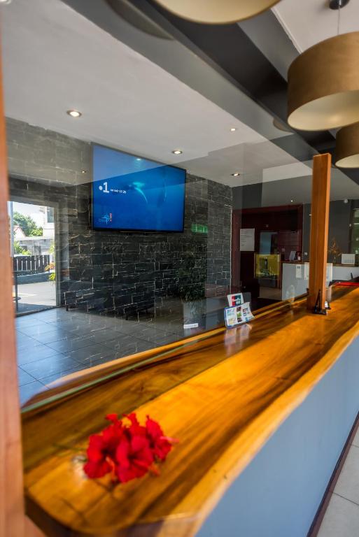 TV a/nebo společenská místnost v ubytování Hotel Sarah Nui