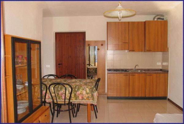 Kuchyň nebo kuchyňský kout v ubytování Hotel Residence La Rotonda