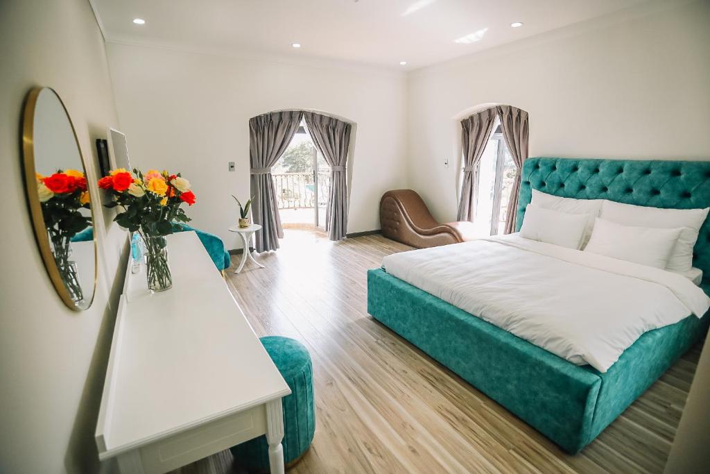 Postel nebo postele na pokoji v ubytování Memory Inn - Green Villa