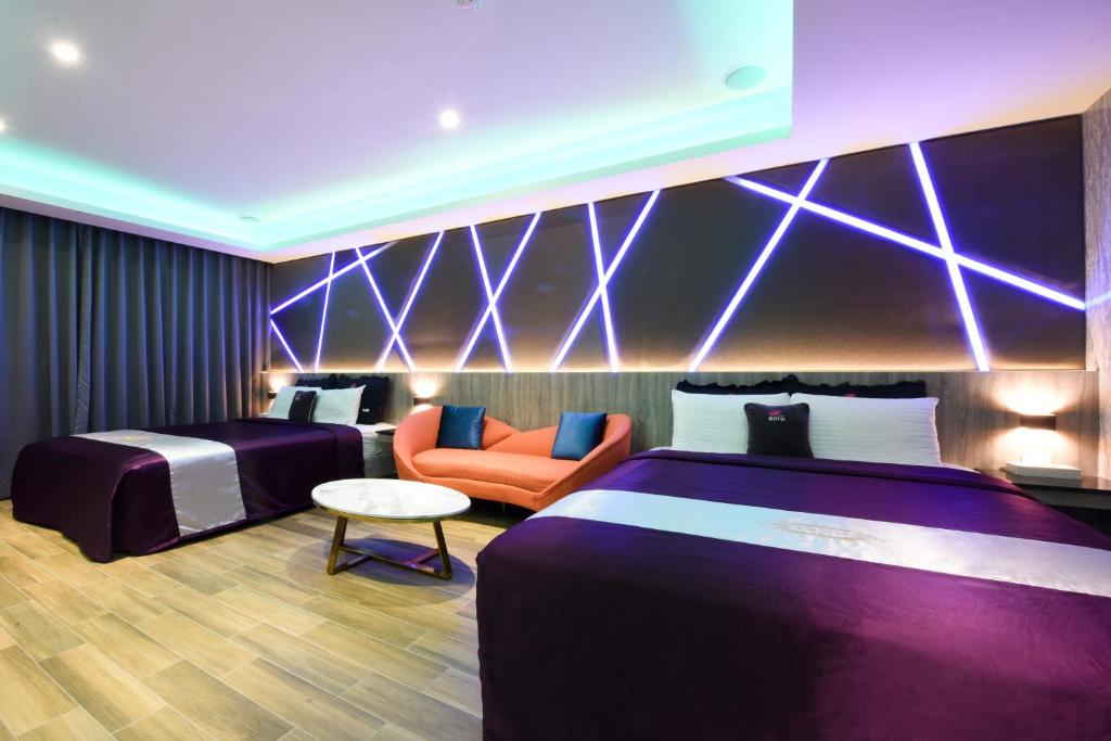 Postel nebo postele na pokoji v ubytování I-Like Motel