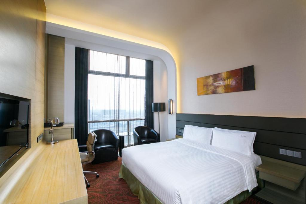 Postel nebo postele na pokoji v ubytování Holiday Inn Shanghai Songjiang by IHG - Miaoqian Street