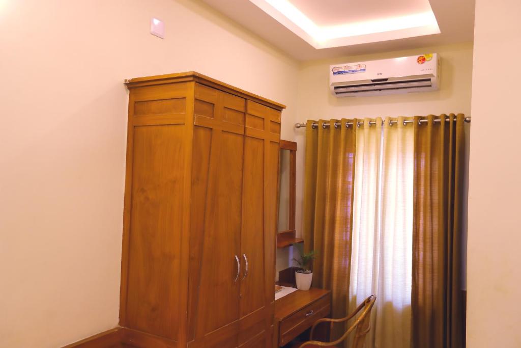 Fotografie z fotogalerie ubytování SAPPHIRE INN v destinaci Nedumbassery