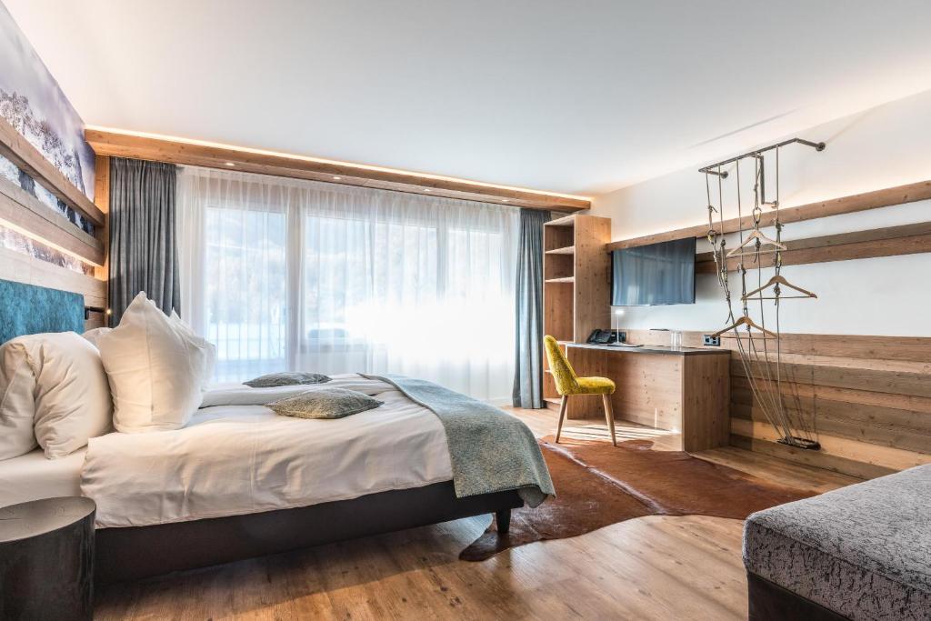 Postel nebo postele na pokoji v ubytování Hotel Hemizeus & Iremia Spa