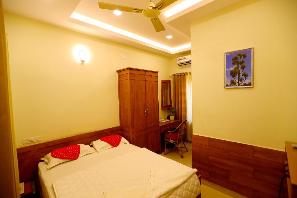 Postel nebo postele na pokoji v ubytování SAPPHIRE INN