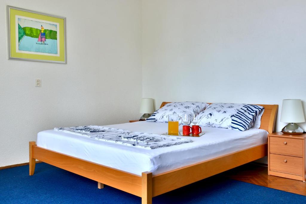Posteľ alebo postele v izbe v ubytovaní Apartment Lela