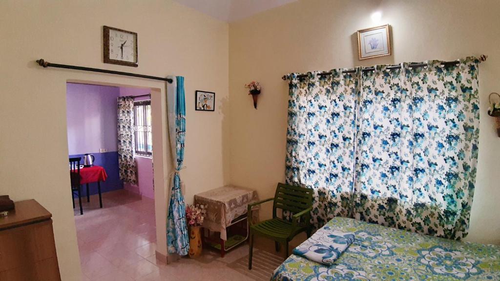 Postel nebo postele na pokoji v ubytování Noel Guest House