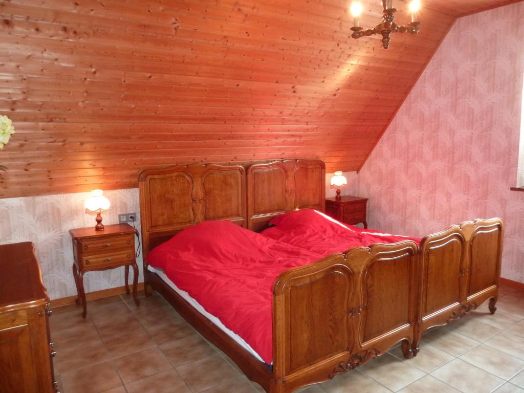 Postel nebo postele na pokoji v ubytování Marronnier