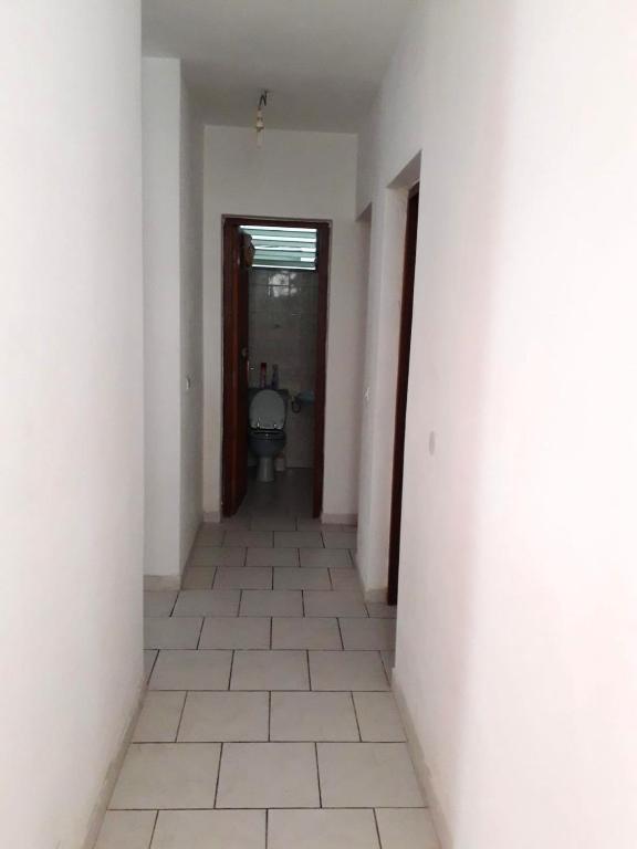 an empty hallway with a toilet in a room at Maison de 3 chambres avec vue sur la mer terrasse et wifi a Vieux Habitants in Vieux-Habitants
