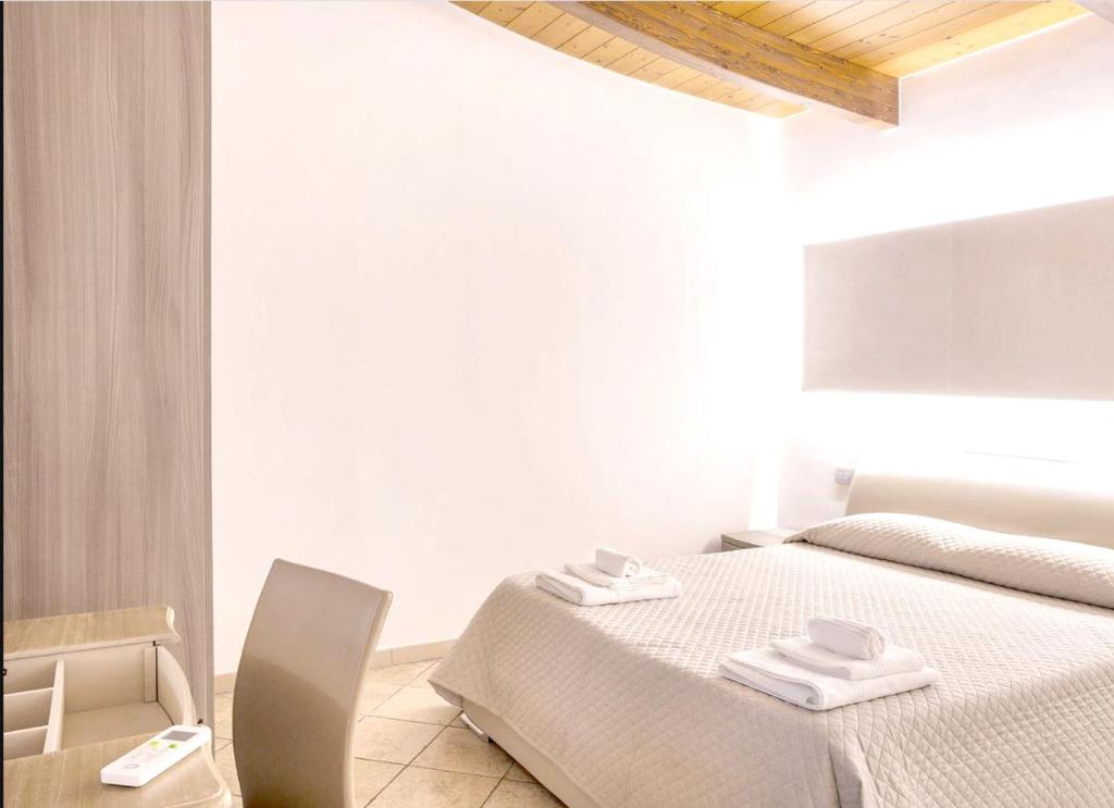 Letto o letti in una camera di One bedroom appartement with shared pool furnished terrace and wifi at Martina Franca